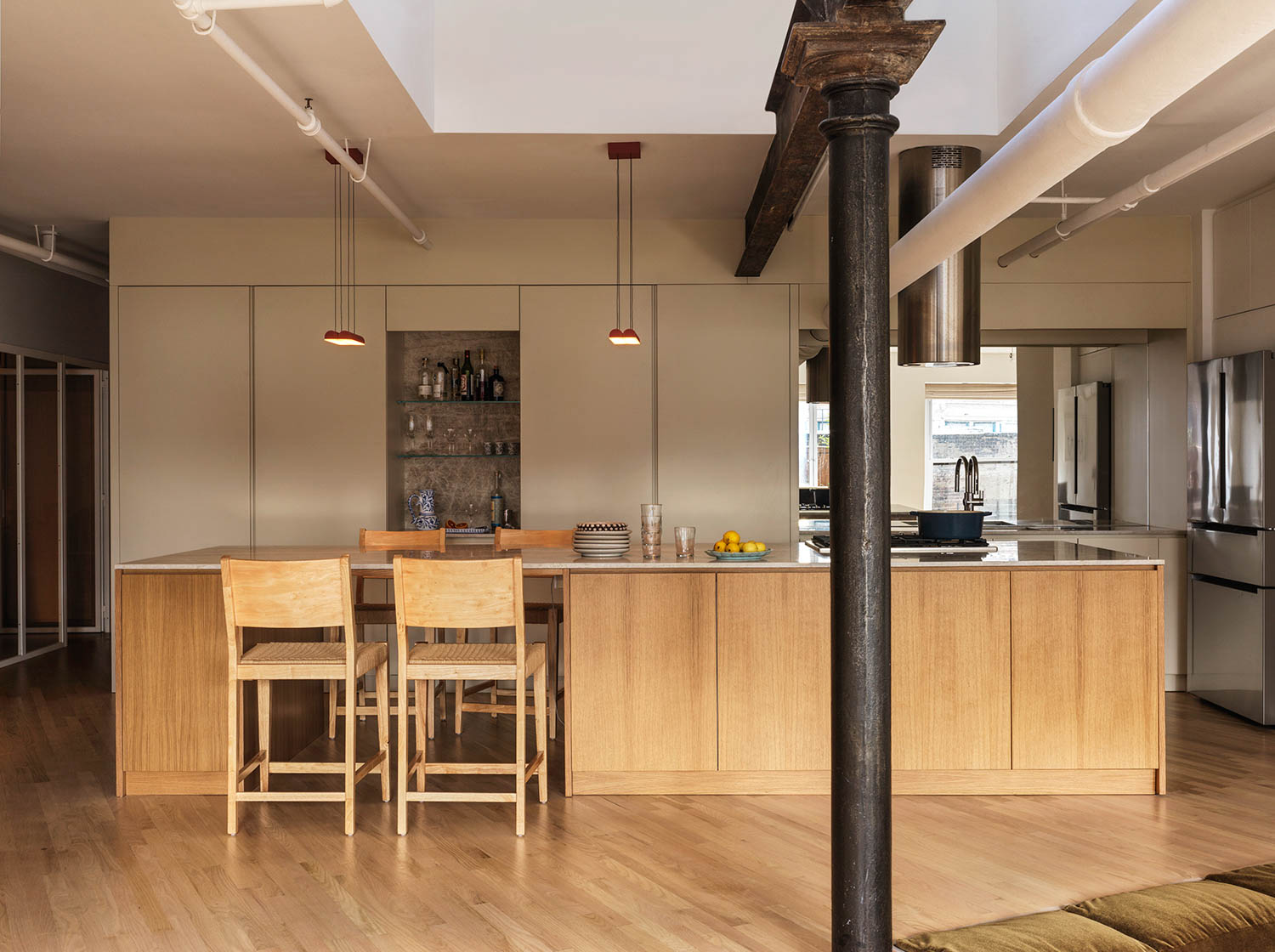 A kitchen with industrial elements in a loft apartment
