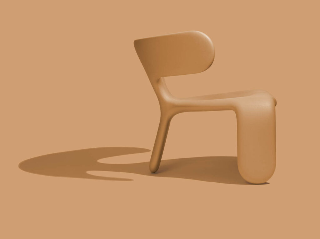 A tan chair by Atlason for Heller