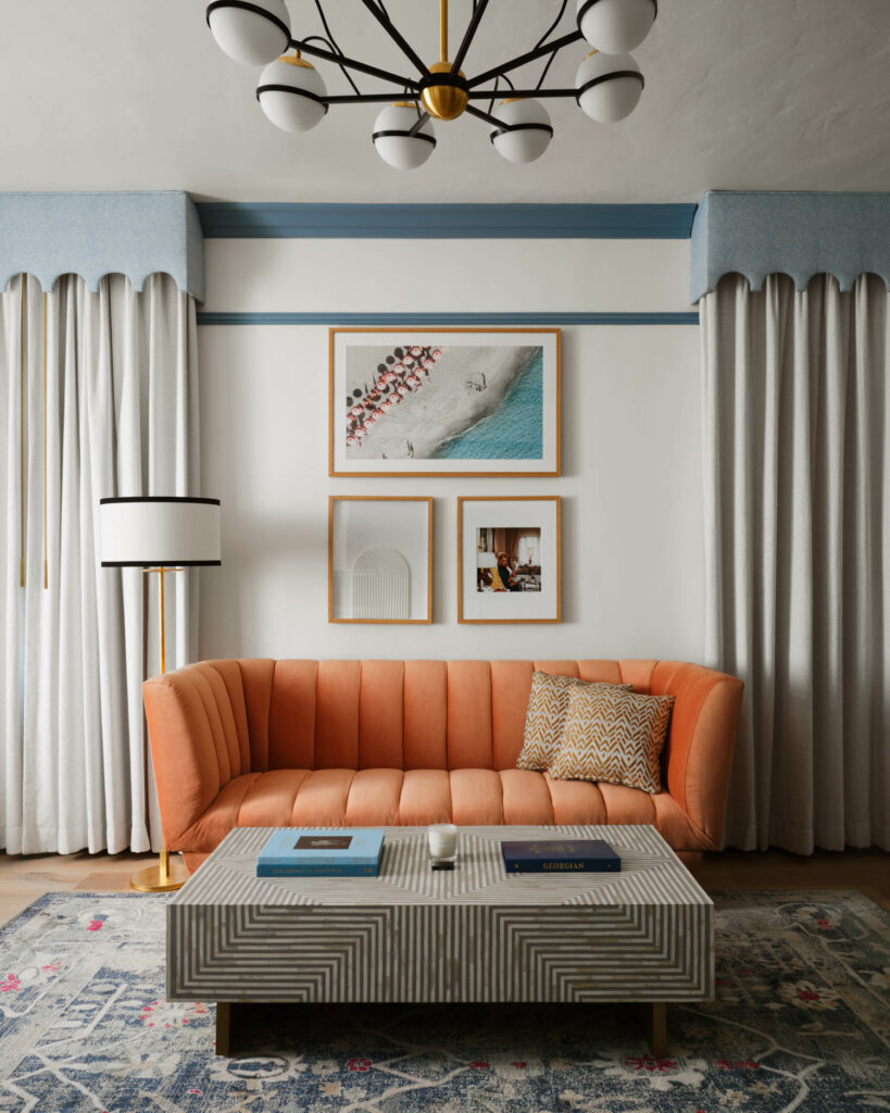 beachy artwork rests on the walls of a corner suite at this hotel