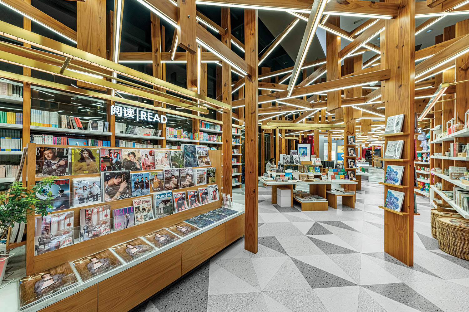 forestlike solid-pine beams and columns in an airport bookstore