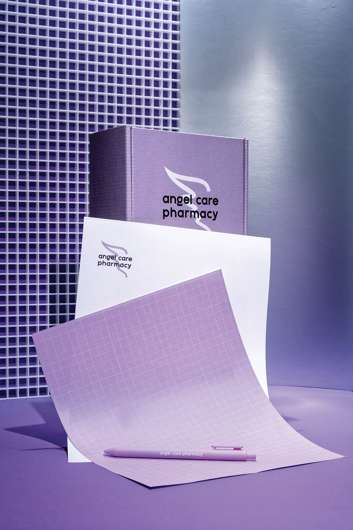 branded, compostable purple packaging for Angel Care Pharmacy