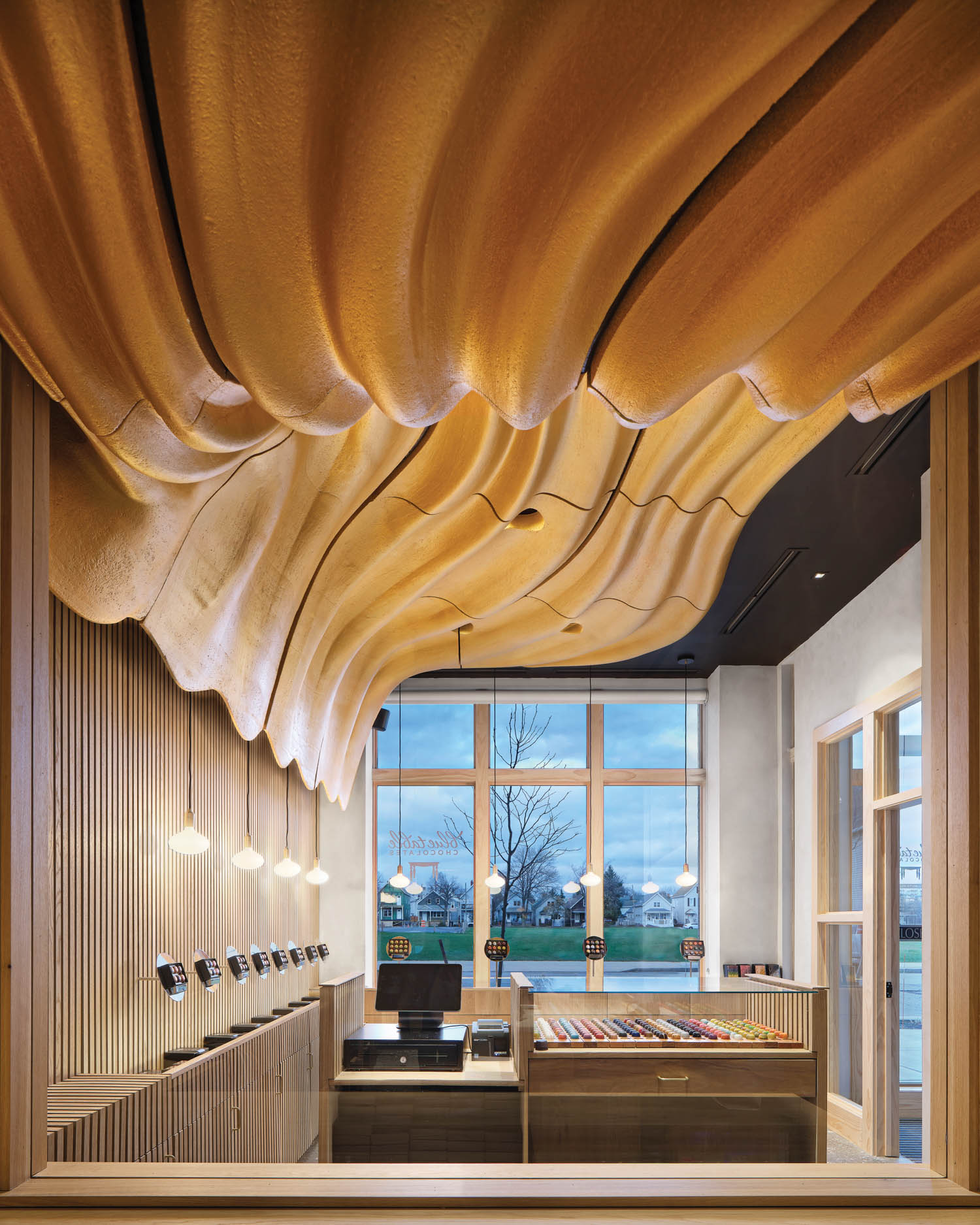 the wavy, river-like ceiling of a New York chocolate shop