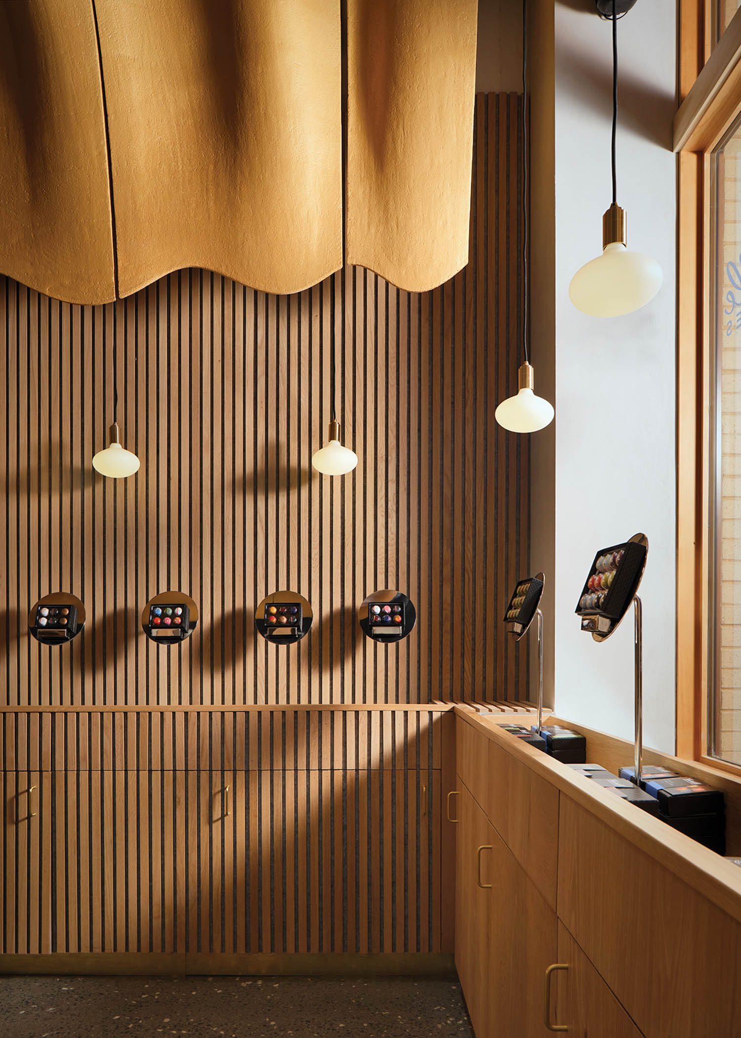 paneled walls with circular displays for chocolates