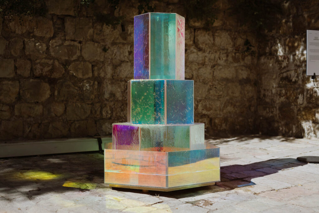 a fountain made of transparent colored acrylic