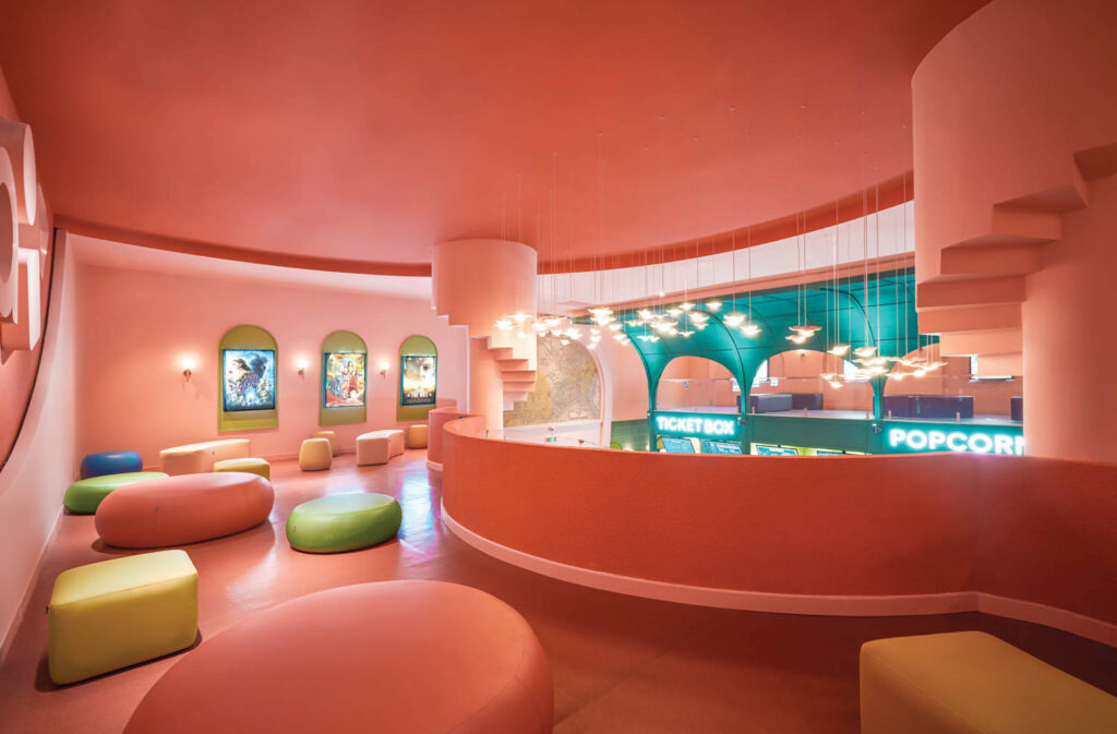 a saturated pink cinema interior