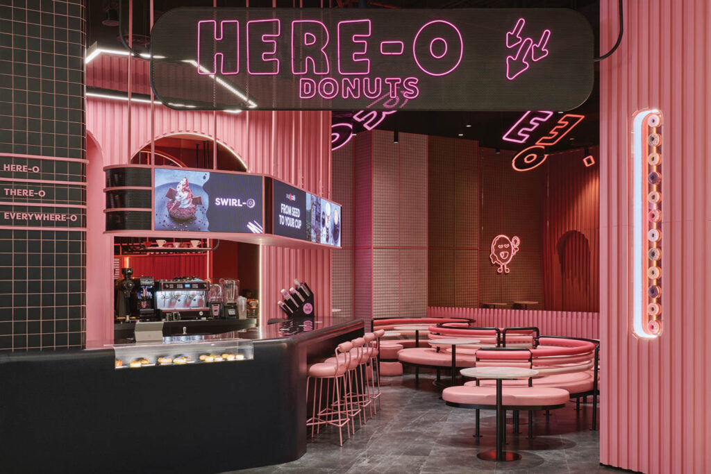 Pink interior of Here O donut shop in Dubai by Roar