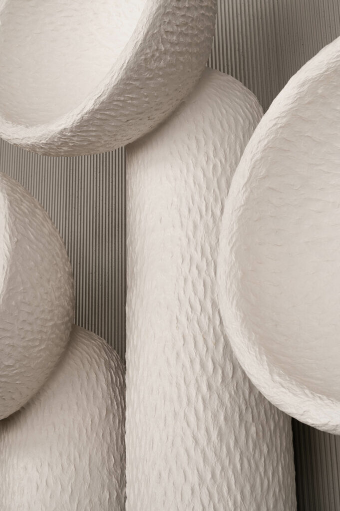 a close up of ceramic Soniah lamps with the texture of deeply engraved fingerprints